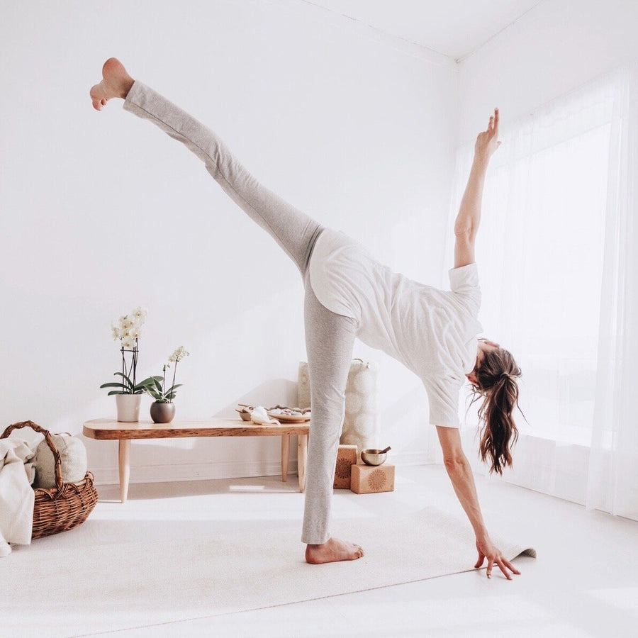 Standing split in the ecru mid sleeve tunic